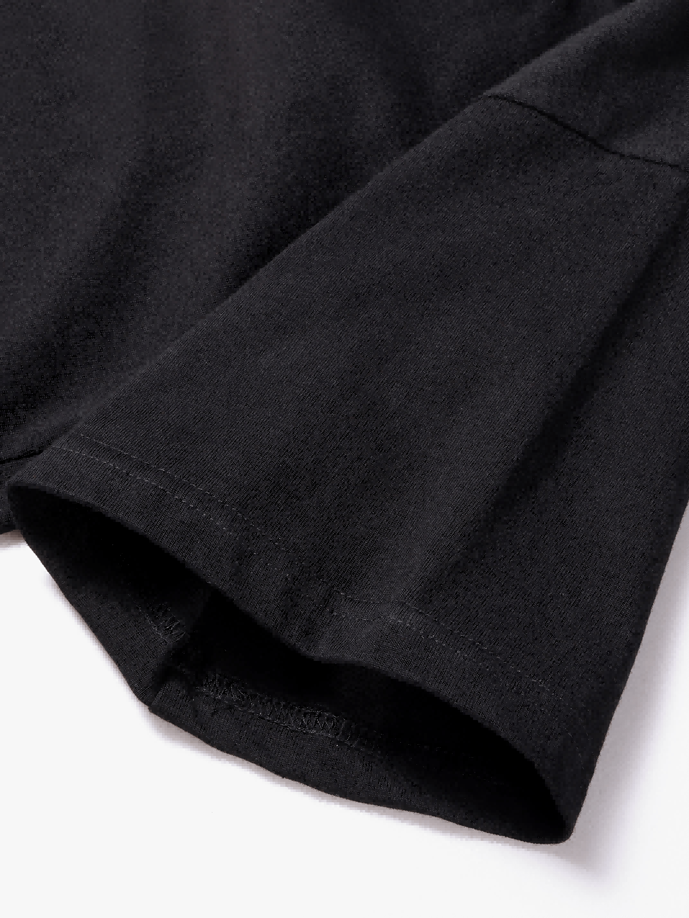 Close-up of bear with boxing gloves print on black t-shirt